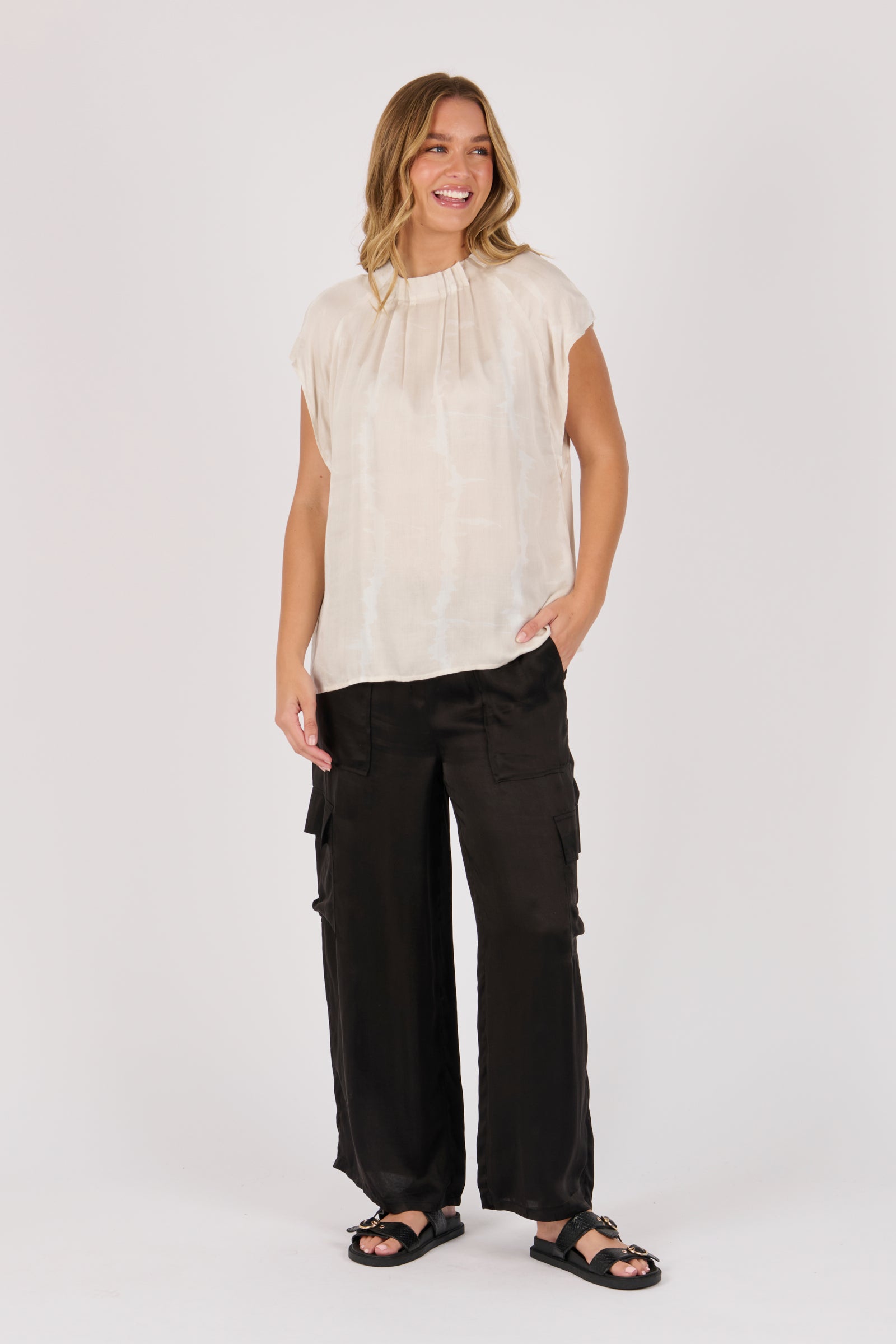 Ellis & Dewey Pleat Neckline Blouse in Gardenia – viscose satin twill blouse with pleated neckline and cap sleeves, designed in Geelong Australia.