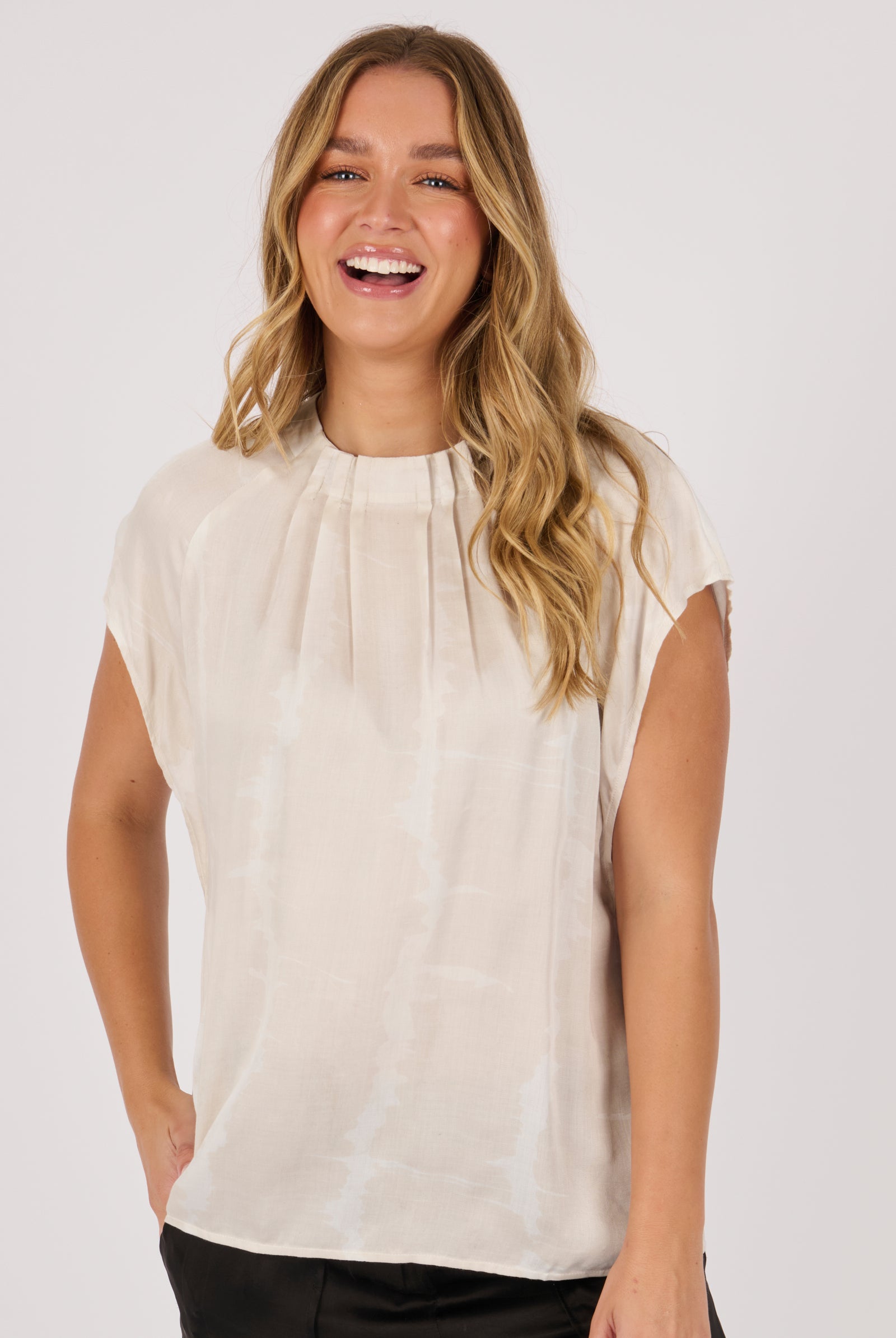 Ellis & Dewey Pleat Neckline Blouse in Gardenia – viscose satin twill blouse with pleated neckline and cap sleeves, designed in Geelong Australia.