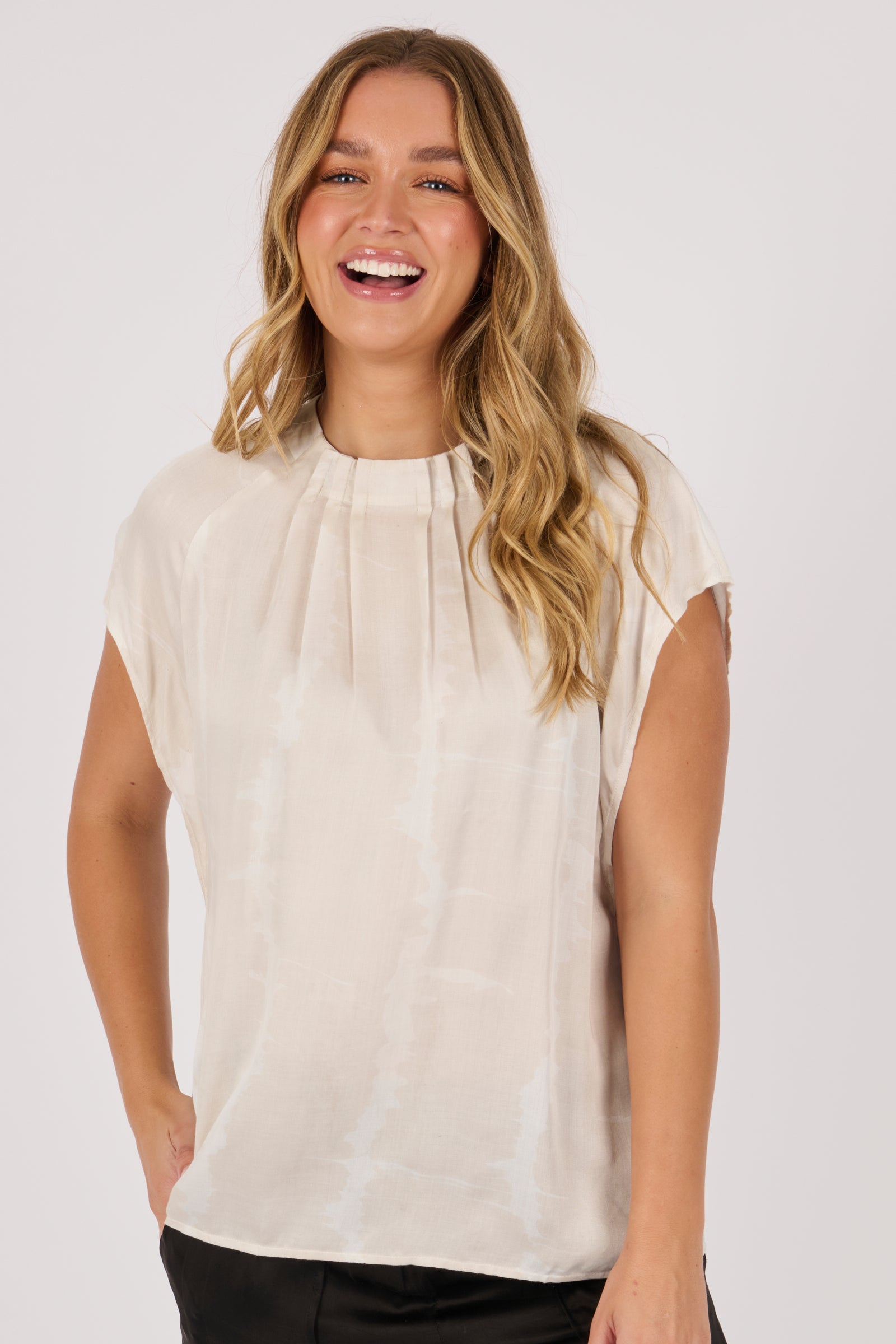 Ellis & Dewey Pleat Neckline Blouse in Gardenia – viscose satin twill blouse with pleated neckline and cap sleeves, designed in Geelong Australia.