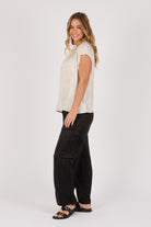 Ellis & Dewey Pleat Neckline Blouse in Gardenia – viscose satin twill blouse with pleated neckline and cap sleeves, designed in Geelong Australia.