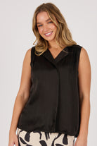 Ellis & Dewey Lapel Feature Tank in Black – viscose bambra satin sleeveless top with soft lapel neckline and relaxed drape, designed in Geelong Australia.
