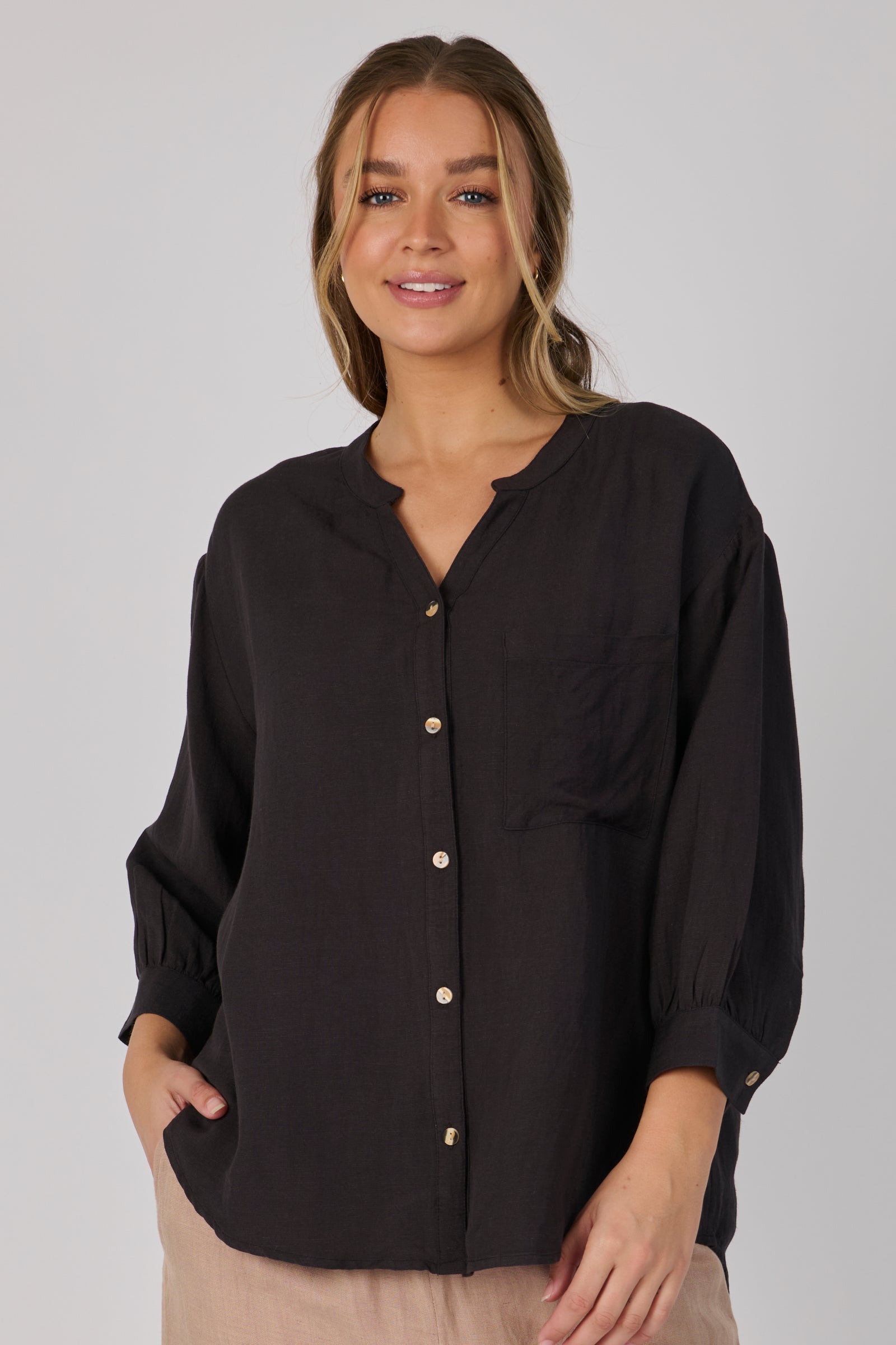 Ellis & Dewey Drop Back Blouse in Ink – linen lyocell button-through blouse with drop-back hem, gathered cuffs, and relaxed silhouette, designed in Geelong Australia.