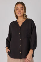 Ellis & Dewey Drop Back Blouse in Ink – linen lyocell button-through blouse with drop-back hem, gathered cuffs, and relaxed silhouette, designed in Geelong Australia.