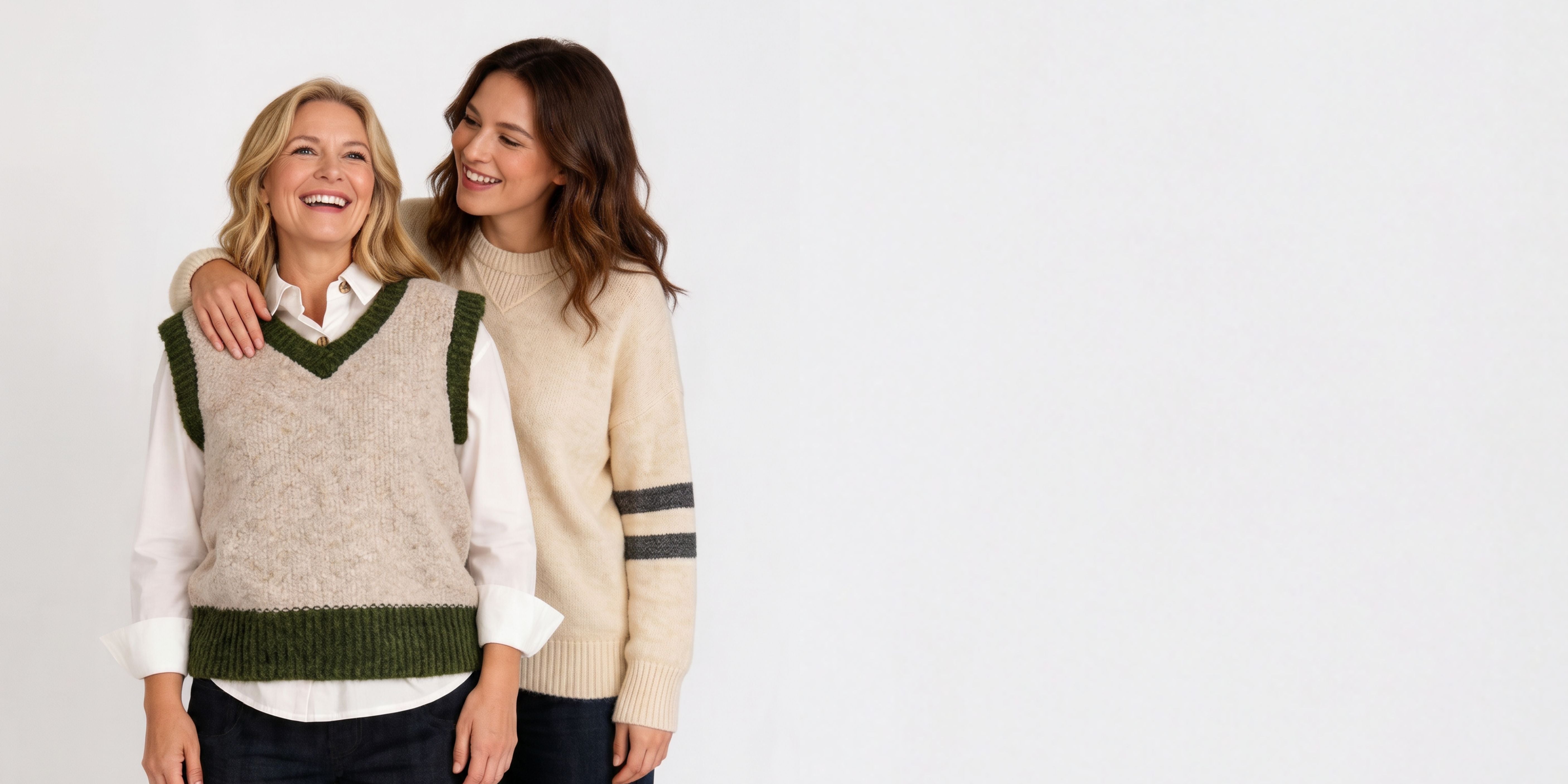 Mum & Daughter standing next to each other in knitwear